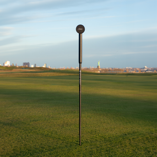 GPOD X Magnetic monopod on the range of a golf course for filming golf swings