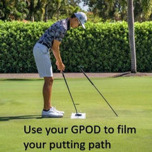 Load image into Gallery viewer, GPOD golf phone caddy inserted into the ground to film putting swing
